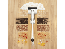 Charger l&#39;image dans la galerie, Aspirateur nettoyant des aliments. Spaghettis, œufs et autres débris sur un plancher en bois.
