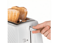 Charger l&#39;image dans la galerie, Une main actionnant un grille-pain blanc avec deux tranches de pain grillé.
