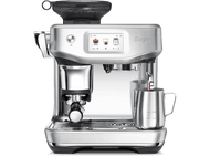 Une machine à expresso en acier inoxydable avec écran et pichet à mousse de lait.