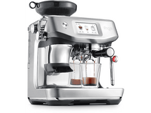 Charger l&#39;image dans la galerie, Machine à expresso argentée avec deux expressos versés dans des tasses en verre.
