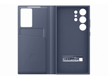 Charger l'image dans la galerie, Étui de téléphone bleu ouvert avec fentes pour cartes. Vue intérieure avec découpes pour appareil photo et étiquette blanche.
