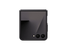 Charger l&#39;image dans la galerie, Un smartphone noir plié sur fond noir. Il possède deux caméras et un flash. L&#39;écran est un dégradé de violet et de gris.
