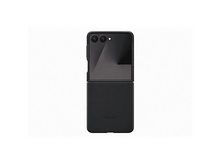 Charger l&#39;image dans la galerie, Téléphone pliable Samsung noir sur fond blanc. Téléphone partiellement ouvert. Le logo Samsung est visible.
