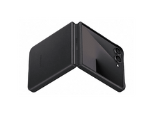 Charger l&#39;image dans la galerie, Un téléphone pliable Samsung noir partiellement ouvert. Le téléphone est sur une surface blanche. L&#39;écran est visible avec des lentilles de caméra.
