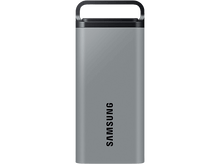 Charger l'image dans la galerie, Une clé USB Samsung argentée avec une poignée noire, sur fond noir.
