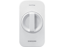 Charger l&#39;image dans la galerie, Appareil SmartThings blanc avec cadran central et logo Samsung sur fond noir.
