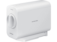 Charger l&#39;image dans la galerie, Appareil blanc avec étiquette SmartThings, texte &#39;Moins de microfibres&#39; et cadran rotatif.
