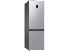 Charger l'image dans la galerie, Un réfrigérateur argenté avec congélateur en bas, sur fond blanc.
