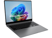 Charger l&#39;image dans la galerie, Un ordinateur portable argenté avec un écran coloré, affichant un graphique, sur une surface blanche.
