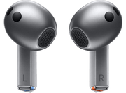 Deux écouteurs gris avec les lettres L et R. Ils sont sur fond noir.