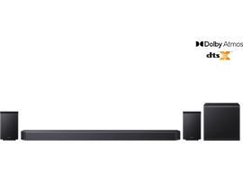 Barre de son noire avec deux enceintes et un caisson de basses sur fond noir.