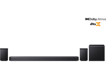 Barre de son noire avec deux enceintes et un caisson de basses sur fond noir.