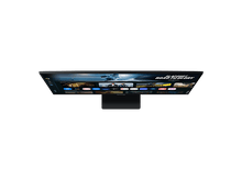 Charger l'image dans la galerie, Un moniteur affiche une interface de service de streaming. L'écran montre diverses icônes d'applications et titres de films sur fond noir.
