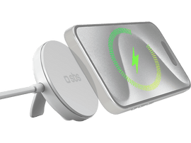 Chargeur sans fil argenté avec un téléphone dessus. Indicateur de charge vert.