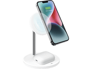 Support de charge blanc avec un iPhone et des AirPods. Le téléphone affiche un statut de charge de 100 %. Fond noir.