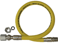 Tuyau de gaz jaune avec raccords métalliques. Il est enroulé. Texte sur le tuyau.