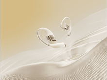 Charger l&#39;image dans la galerie, Deux écouteurs crème flottants. Flottent sur un fond beige avec des lignes ondulées.
