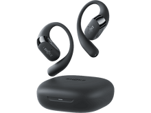 Charger l&#39;image dans la galerie, Écouteurs Shokz noirs et étui de chargement sur fond noir.
