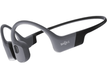 Charger l&#39;image dans la galerie, Casque à conduction osseuse Shokz gris, un design léger à oreilles ouvertes.
