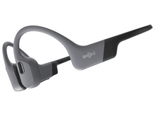 Charger l&#39;image dans la galerie, Casque Shokz gris. Ce sont des écouteurs à conduction osseuse, gris et noirs.
