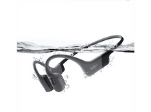 Charger l&#39;image dans la galerie, Casque à conduction osseuse gris immergé dans l&#39;eau. Le casque est mis au point.
