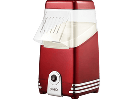 Une machine à pop-corn rouge. Elle a un dessus blanc, un couvercle transparent et un bouton d