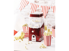 Charger l&#39;image dans la galerie, Une machine à pop-corn rouge avec du pop-corn dans des tasses et des contenants.
