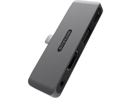 Un adaptateur multiport USB-C SITECOM gris avec ports HDMI, USB et audio sur fond noir.