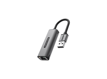 Charger l&#39;image dans la galerie, Un adaptateur USB vers Ethernet Sitecom gris est présenté sur fond noir.
