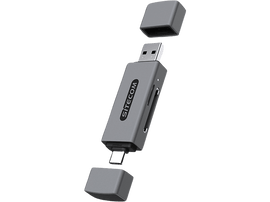 Clé USB grise, capuchons retirés, sur fond noir. La marque SITECOM est visible.