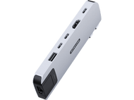 Un adaptateur multi-ports Sitecom argenté avec divers ports sur fond noir.