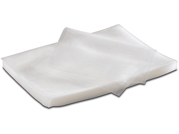 Plusieurs sacs de scellage sous vide transparents empilés les uns sur les autres. Les sacs ont une surface texturée.