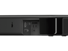 Charger l&#39;image dans la galerie, Arrière d&#39;une barre de son noire. Les ports incluent HDMI, USB et audio optique.
