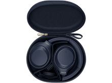 Charger l&#39;image dans la galerie, Casque Sony dans un étui bleu marine, ouvert. Le casque est également bleu marine.
