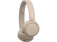 Charger l&#39;image dans la galerie, Casque Sony beige. L&#39;écouteur droit est légèrement incliné vers le spectateur.
