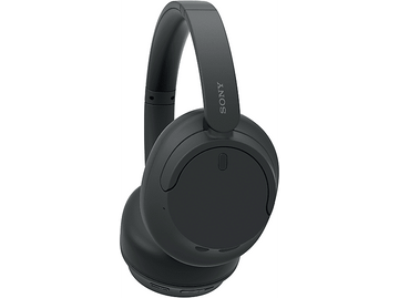 Casque Sony noir incliné, montrant le nom de la marque. Les oreillettes sont grandes et rondes.