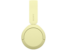 Charger l&#39;image dans la galerie, Vue de dessus d&#39;un casque Sony jaune sur fond blanc. Les oreillettes sont rondes.
