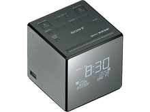 Charger l&#39;image dans la galerie, Un réveil Sony gris. Il est carré avec un affichage numérique qui affiche 8h30.
