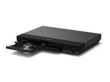 Charger l&#39;image dans la galerie, Lecteur DVD noir avec un tiroir à disque ouvert. Le disque est visible.
