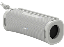 Charger l&#39;image dans la galerie, Un haut-parleur portable gris avec un cordon blanc, incliné sur un fond noir.
