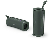 Charger l&#39;image dans la galerie, Deux enceintes cylindriques vertes avec le logo Sony, une couchée et une debout.
