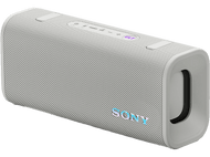 Un haut-parleur Sony blanc et gris sur fond noir, avec le logo Sony en bleu.