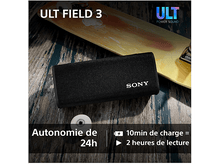 Charger l&#39;image dans la galerie, Haut-parleur noir sur une planche à roulettes en bois. Le texte sur la batterie est visible.
