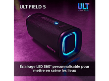 Charger l&#39;image dans la galerie, Haut-parleur noir avec lumière bleue. Texte blanc : ULT FIELD 5 et SONY. Fond violet.
