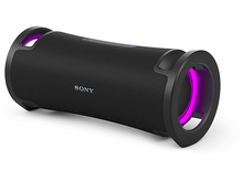 Charger l&#39;image dans la galerie, Haut-parleur Sony noir avec des accents violets, forme cylindrique.
