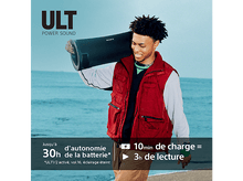 Charger l&#39;image dans la galerie, Un homme avec un haut-parleur sur l&#39;épaule, montrant la durée de vie de la batterie et la charge rapide.
