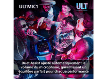 Charger l&#39;image dans la galerie, Groupe de personnes autour d&#39;un haut-parleur. Lumières et microphone visibles.
