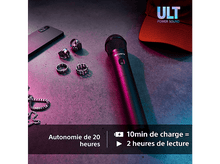 Charger l&#39;image dans la galerie, Un microphone noir avec le logo Sony, des bagues, un téléphone et un chapeau sur une surface en béton.
