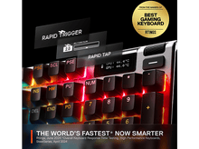 Charger l&#39;image dans la galerie, Clavier gaming avec touches éclairées, couleurs rouge, orange et jaune. Fond noir.
