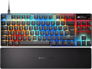 Clavier noir avec touches colorées. Il a un repose-poignet. Touches blanches et colorées. Logo SteelSeries.